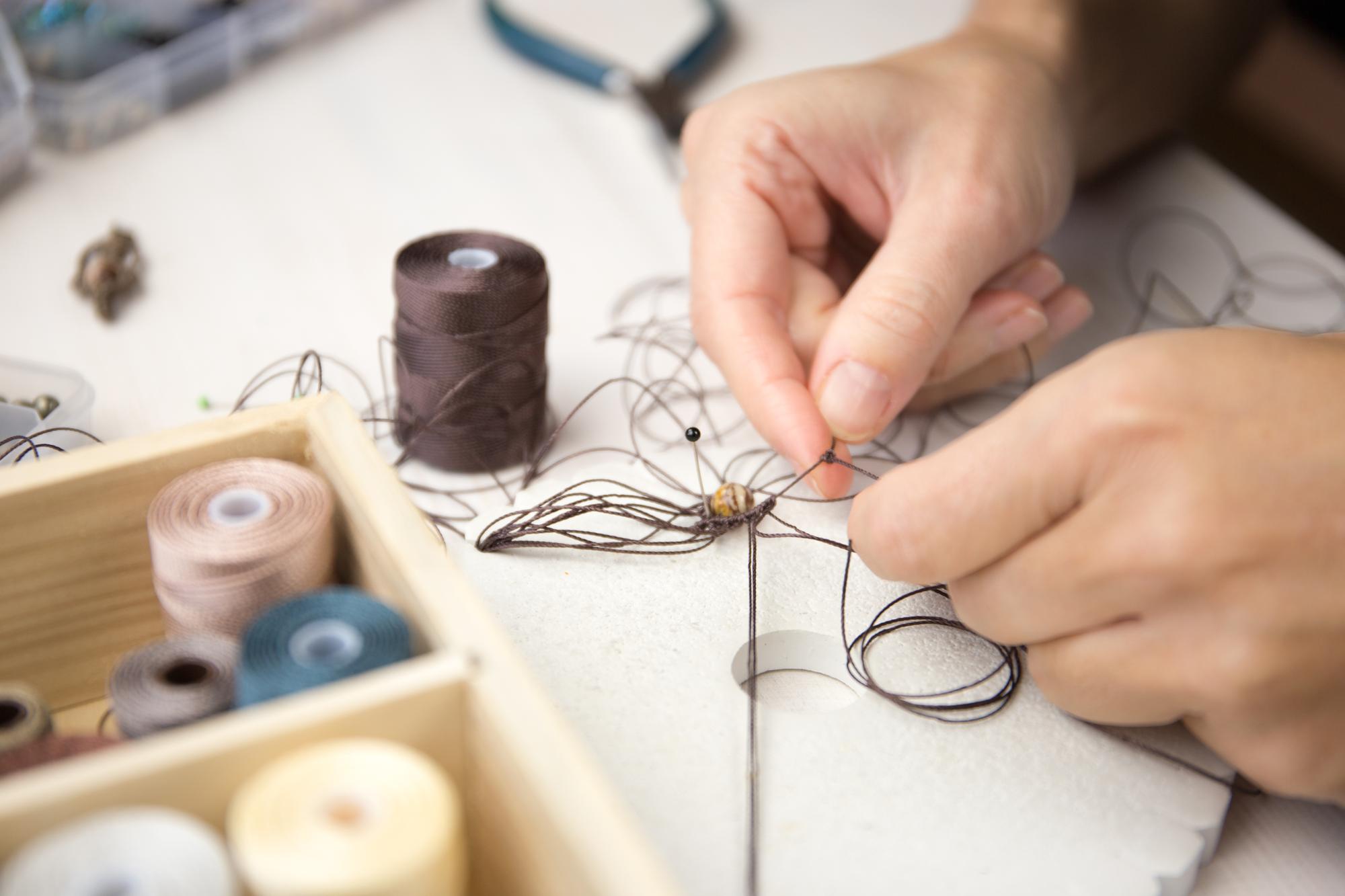 Workshop table with embroidery tools