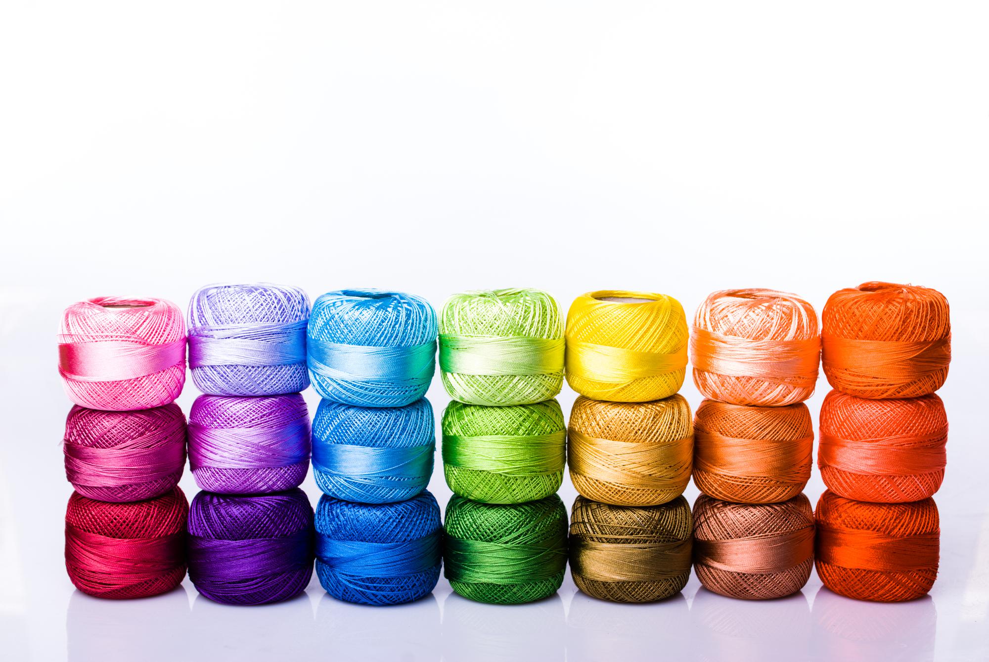 Thread spools arranged by color